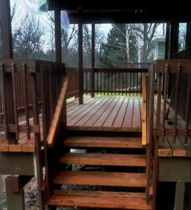 Notice the thickness of the lumber on this Deck House Balcony Deck in Pleasantville NY. Standard decking on stick built houses is 5/4" nominal, about 1" thick actual, whereas the solid cedar decking provided by deck house is 12/4" actually about 2 5/8" thick.   Photograph and stair carpentry by Third Floor apprentice Israel Mermelstein 
